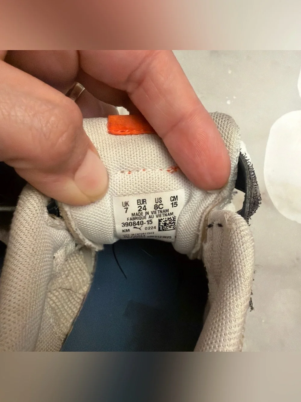 Puma Kids White and Navy Sneakers with Orange Logo Accent